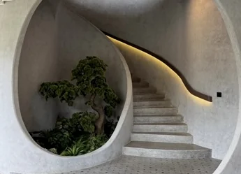 Organic sculptural staircase at You & Me Coffee and Bakery