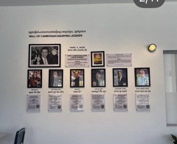 Wall of Cambodian diaspora legends with framed portraits